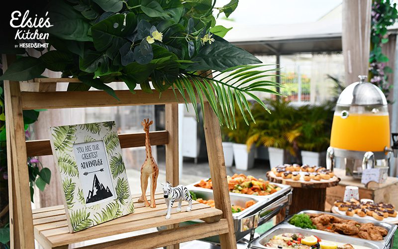Creative safari-themed food display for a kids' birthday party.
