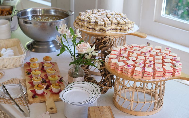 Assorted petite cakes and desserts at an Elsie's Kitchen event.