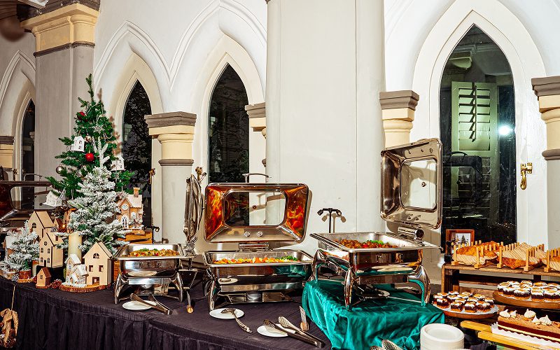 Elsie's Kitchen Christmas themed buffet setup with festive decorations.