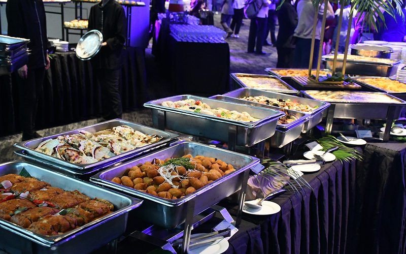 Catering buffet food setup laid out in chafing dishes