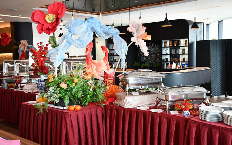 Festive Elsie Kitchen buffet display with varied menu selections.