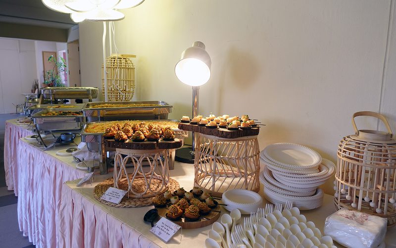 Elegant buffet setup for a themed high tea party.