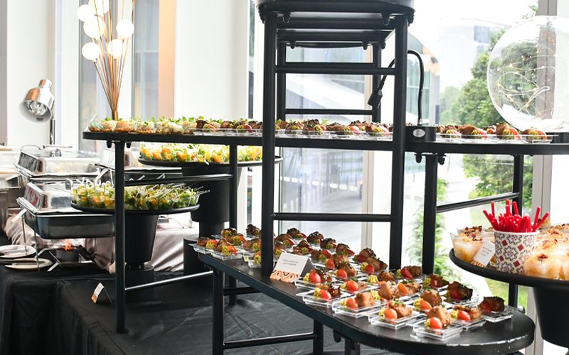 Gourmet finger foods arranged for festive high tea catering.