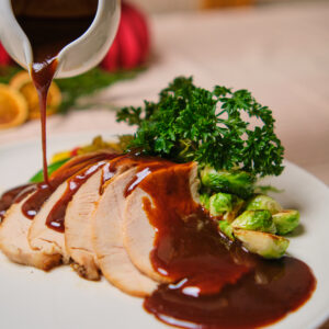Roasted teriyaki turkey served with tori katsu and demiglace sauce