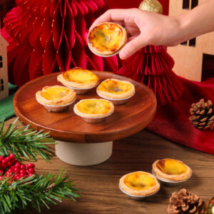 Taro Mochi Portuguese Egg Tarts on a decorative platter